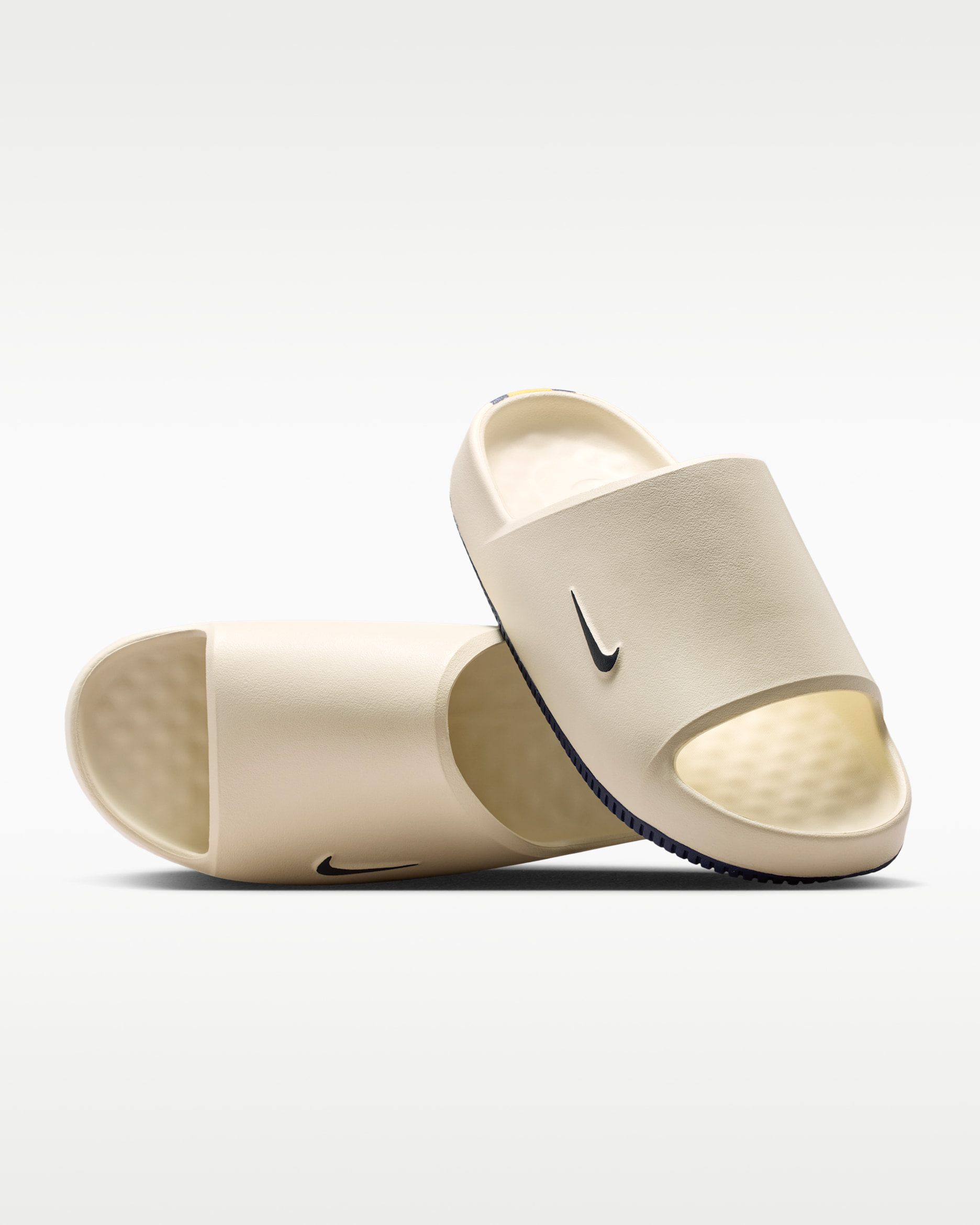 Nike Calm (Michigan) Men's College Slides. Nike.com